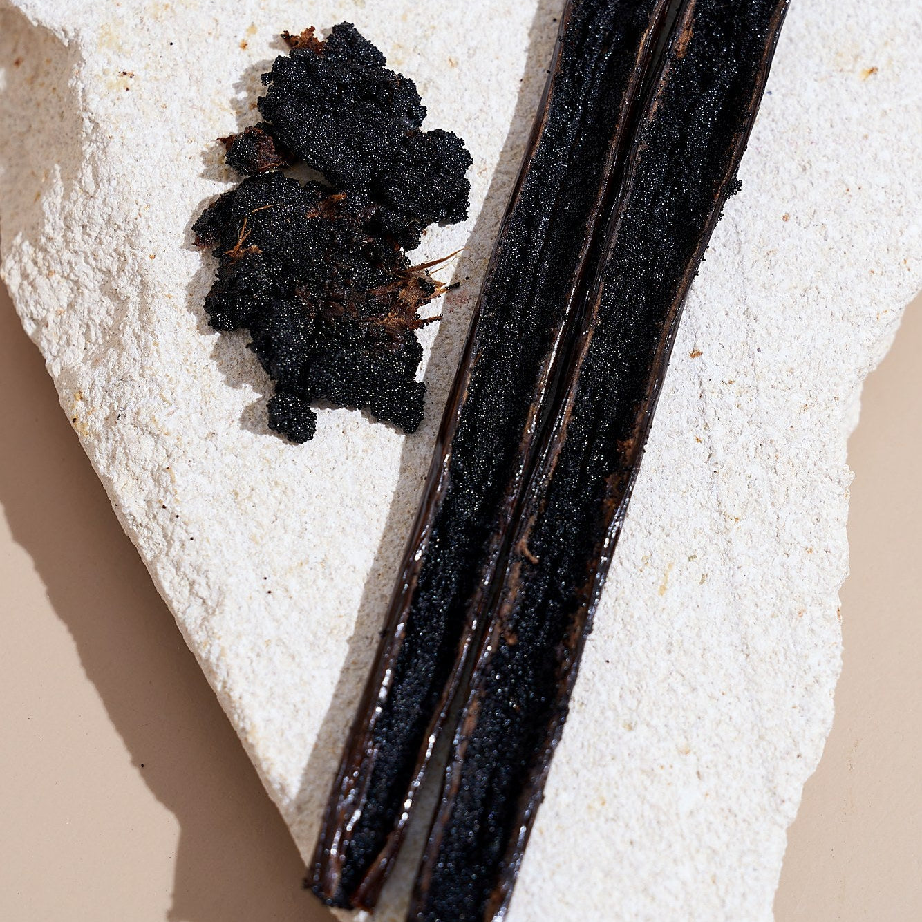 Split Tahitian vanilla pod showing dark vanilla caviar seeds — Tahitian vanilla beans, Papua New Guinea